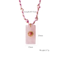Handmade woven cord necklace with pink crystal pendant and golden sunburst detail - Rose Quartz Rectangle Pendant (XB2506005)