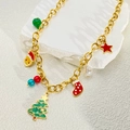 Detail of gold Christmas necklace with festive charms like Santa, reindeer, and bells - Christmas Tree Necklace