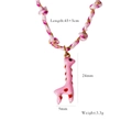 Pink enamel giraffe pendant on pink and white braided rope cord with gold accents - Pink Giraffe Pendant (XB2506030)