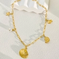 18k gold plated stainless steel necklace featuring seashell, pearl, and starfish charms - Shell