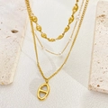 Three-layer gold titanium necklace with pearl accents and oval link pendant design - Pig Nose Style