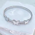 Bracciale in acciaio inossidabile argento con farfalle bianche e accenti in zircone lucido - Argento