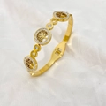 Detailed view of gold plated tree of life bangle with white crystals on silk - Three Tree Of Life Icons Style (B986)