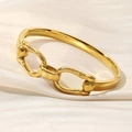 Bracciale rigido in acciaio inossidabile dorato lucido con design a doppio anello a spirale - Oro