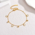 Elegant gold stainless steel necklace featuring white shell charms and zircon spheres - White Bracelet