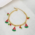 Detail view of gold Figaro chain bracelet with enamel watermelon charms and colorful beads - Watermelon Bracelet / Gold