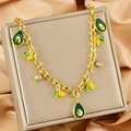 Golden stainless steel necklace featuring avocado fruit pendants with green beads - Avocado Style