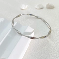Bracciale Mobius in acciaio inossidabile argento lucido con design a spirale ritorta - Colore acciaio