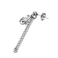 Macro shot of a silver scorpion pendant earring with a long chain and punk metal texture - Scorpion