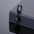 Minimalist black titanium steel tassel earring with shell pendant on a jewelry box - Black