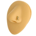 Golden snake nose stud with clear crystals and green eyes shown on a silicone model nose - Snake Style (B1263) / Gold