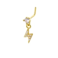 Detail of gold L-shaped nose ring with a dangling lightning bolt and inlaid zircon stones - Gold Lightning Style