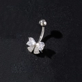 Detailed close-up of a silver butterfly navel ring with inlaid heart-shaped cubic zirconia - Heart Wing Butterfly Style