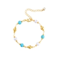 Bracciale boho in acciaio dorato con perline di turchese blu e perle bianche - Oro Stile 2
