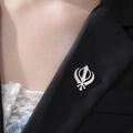 Silver Khanda Sikh symbol brooch pinned on a black suit lapel for men and women - Steel Khanda