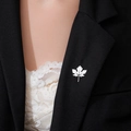 Exquisite silver maple leaf brooch with detailed veins on a black suit jacket - Silver Maple Leaf Pattern