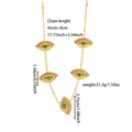 Detail of gold necklace featuring evil eye pendants with green stones and clear zircons - Evil Eye Five Pendant Clavicle Chain (ZHN1128) / Gold