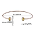 Tabella taglie dettagliata per bracciale rigido in acciaio con pietre gialle e misure - Stile Gemma Gialla (ZHG2257) / Colore acciaio