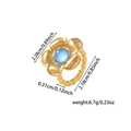 Dettaglio macro dell'anello a fiore placcato oro 18K con turchese e misure indicate - Taglia 7 / Oro-Pietra Blu Lago