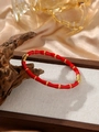 Bamboo style titanium steel bracelet in vibrant red and gold with a glossy enamel finish - Red