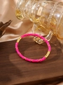 Bamboo-style enamel bangle in rose pink and gold finish with a secure metal clasp - Rose Red
