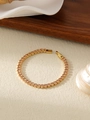 Detail of 18k gold plated tennis bracelet featuring vibrant orange oval-cut crystals - Yellow Rhinestone (ZHB712)