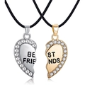 Detailed macro view of two-piece heart pendant friendship necklaces with crystal pavé borders - Gold Silver Mixed Puzzle Heart Halves Combined Nylon Rope