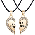Close-up of golden split heart pendants with crystals and Best Friends engraving - Gold Puzzle Heart Halves Combined Nylon Rope