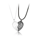 Macro detail of magnetic heart pendants with pinky swear pattern and Forever engraving - Silver & Black