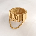 Exaggerated gold mesh ring with bold M letter and hanging metal chain accessory - US 6 / Gold