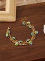 Dettaglio di bracciale multistrato dorato con pietre turchesi e decorazioni floreali - Stile Rettangolare Teal (ZHB49) / Oro