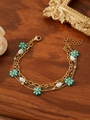 Detail of layered gold bracelet with turquoise flower beads and baroque pearls - Turquoise Flower Irregular Pearl Style (ZHB878金)