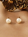 Detailed view of elegant cream pearl earrings on premium champagne silk fabric backdrop - Classic Single Artificial Pearl Style (ZHE328白)