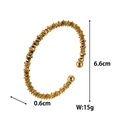 Detail view of golden plum branch open bracelet showing 6.6cm diameter and 15g weight - Mechanical Textured Rectangular Style (ZHG652金) / Gold
