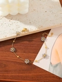 Goldenes Gliederkette-Armband mit transparenten grauen Kristallblüten und Karabiner - Graue Transparente Blume (ZHB630多色20) / Gold/Grau