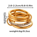 Macro dettagli di anelli multistrato dorati con zirconi e specifiche tecniche sulle misure - Taglia 7 / Stile Strass Pavé Lucido Smerigliato Impilabile (ZHR1851) / 6mm / Oro