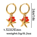 Detailed view of starfish crystal drop earrings with 3.4cm height and 1.5cm width dimensions - Red Starfish Crystal Style (ZA0015) / Gold
