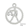 Macro shot of silver Libra zodiac pendant with 19x22.5mm dimensions and 2.05g weight - Libra / Antique Silver