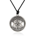 Macro shot of silver crescent moon and pentagram pendant with Celtic knot details - Waxed Cord / Antique Silver