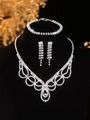 Macro shot of luxurious silver bridal jewelry set with sparkling rhinestones and tassels - Silver Geometric Ring Tassel Necklace Bracelet Earrings Set (PJ--T0218)