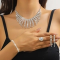 Sparkling silver bridal jewelry set with layered necklace and pear-cut ring - Silver Tassel Pear Shaped Diamond Necklace Bracelet Earrings Ring Set (PJ--T0225)