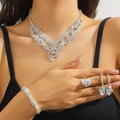 Elegant 4-piece bridal jewelry set with sparkling rhinestones in a silver finish - Silver Tassel Diamond Row Necklace Bracelet Earrings Ring Set (PJ--T0231)