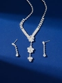 Silver bridal jewelry set featuring floral zircon necklace and matching tassel earrings - Silver Flower Tassel Set (PJ--T0028)