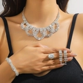 Elegant silver rhinestone bridal jewelry set with necklace and tassel earrings - Silver Hollow Curved Necklace Bracelet Earrings Ring Set (PJ--T0234)