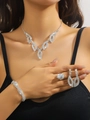 Elegant silver bridal jewelry set with sparkling diamonds on a model for a gala - Silver Heart Diamond Necklace Bracelet Earrings Ring Set (PJ--T0236)
