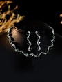 Close-up of bridal jewelry set with emerald green stones on black neck display - Silver Dark Green Vine Pattern Set (PJ--T0030)