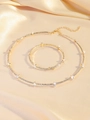 Golden jewelry set with marquise-cut crystals including necklace and bracelet on silk - Golden Marquise Cut Rhinestone Necklace and Bracelet Set (PJ--T0044)