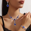 Elegant bridal jewelry set with dark blue pear-cut stones and silver finish - Silver Blue Gem Three-Piece Set (PJ--T0065--1)
