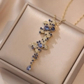 Luxurious butterfly pendant necklace with blue sapphire and crystals on a velvet box - Butterfly Tassel Necklace (X1613)