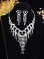 Silver heart tassel jewelry set featuring a multi-layered rhinestone necklace and earrings - Heart Tassel Set (PJ--T0087) / Silver